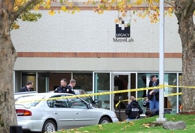 Scene of the shooting at the Legacy MetroLab facility in Tualatin, Oregon, in which two people died and two were injured. The glass broken by gunfire is clearly visible.