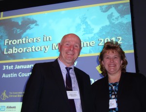At Frontiers in Laboratory Medicine (FiLM) in Birmingham, England, on Tuesday, January 31, 2012. Pictured here Michael Thomas, President of the Association for Clinical Biochemistry and Jean Hammalev, Executive Director, Program Office & Quality, Sonora Quest Laboratory Services/Laboratory Services of Arizona. Hammalev spoke about patient-centered care and the improvement projects her medical laboratory has implemented to raise the quality and consistency of patient care.