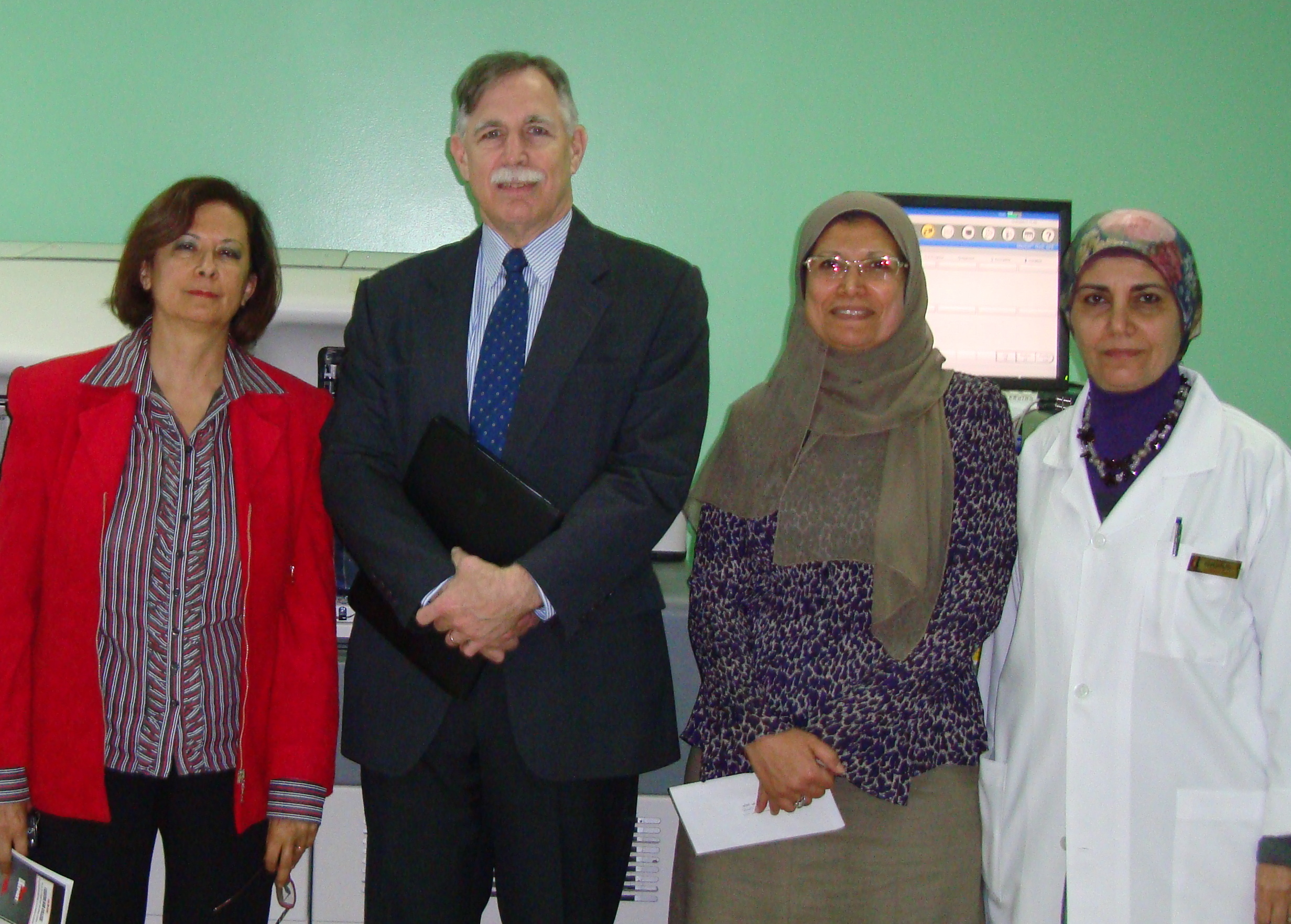 At the laboratory of Ain Shams Specialized Hospital in Cairo, Egypt (from L). The lab site visit included: Dr. Hanzada I. Abd El Fattah, Professor of Clinical Pathology and Clinical Chemistry; Robert Michel, Editor, Dark Daily; Dr. Dalia Helmi Faraq, Professor of Clinical Pathology; and Dr. Manal Z. Maran, Professor of Clinical Pathology and Immunology.