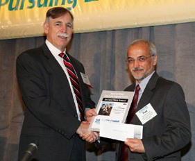 At Lab Quality Confab 2011, Fazi Amirahmadi, Ph.D., (at right), the Systems Engineer Manager at Mayo’s Department of Laboratory Medicine and Pathology, received a national award for his Lean Six Sigma poster presentation titled: “Applying Lean to Improve the Clinical Laboratory Science (CLS) Rolling Admissions Process.” Handing the award to Amirahmadi is Robert L. Michel, Founder and Producer of Lab Quality Confab.