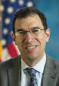 “Many of these ACOs are demonstrating that they can deliver a higher level of coordinated care that leads to healthier people and smarter spending,” stated Andrew Slavitt (above), Acting Administrator at the Centers for Medicare and Medicaid Services. (Photo copyright: Centers for Medicare and Medicaid Services.)