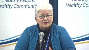 Pictured above is Vicki Kaminski, CEO of Alberta Health Services. At a press conference last Friday, she announced the selection of Sonic Healthcare Limited of Sydney, Australia, as the preferred proponent for the 15-year medical laboratory-testing contract involving Edmonton and the central and northern regions of Alberta. Negotiations to finalize this contract are expected to take in about four months. (File photo copyright Canadian Broadcasting Company.)