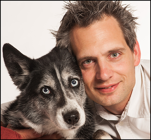 Holger Volk, PhD and medical dog an Australian Shepherd 
